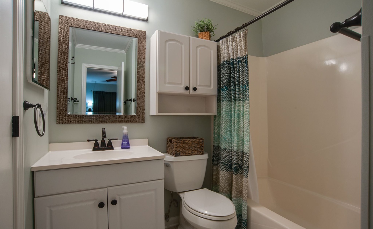 Your private bathroom features a shower-tub combo, stylish vanity, and thoughtful touches for your comfort and convenience.