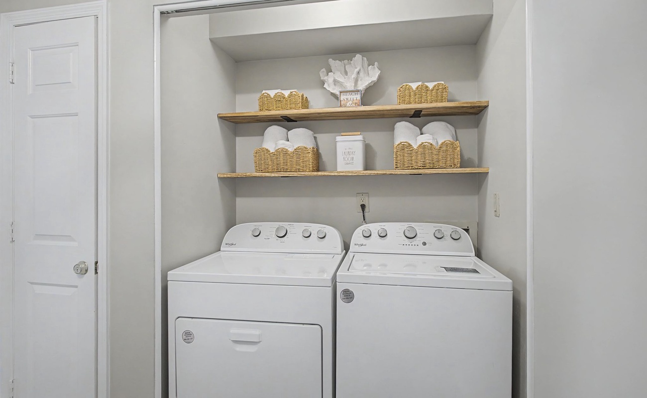 Your in-unit laundry nook keeps you organized with full-size washer and dryer, plus open shelving for all your linens and toiletries.