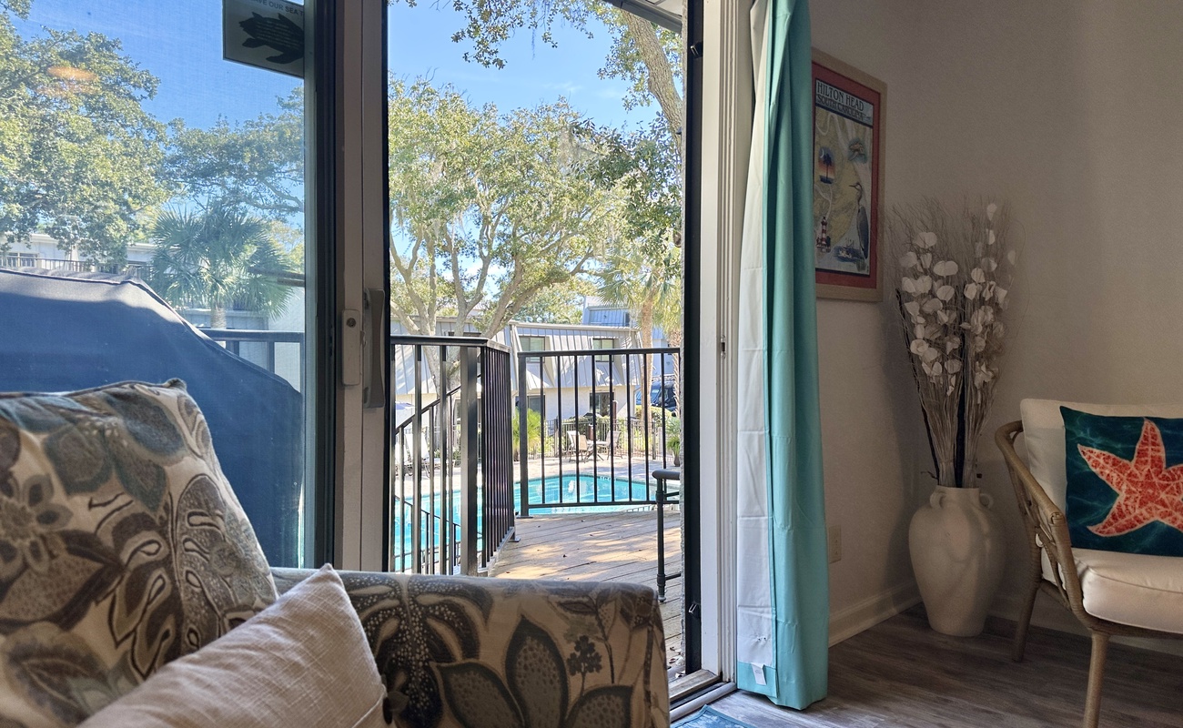 Living Area with Balcony and Pool Access