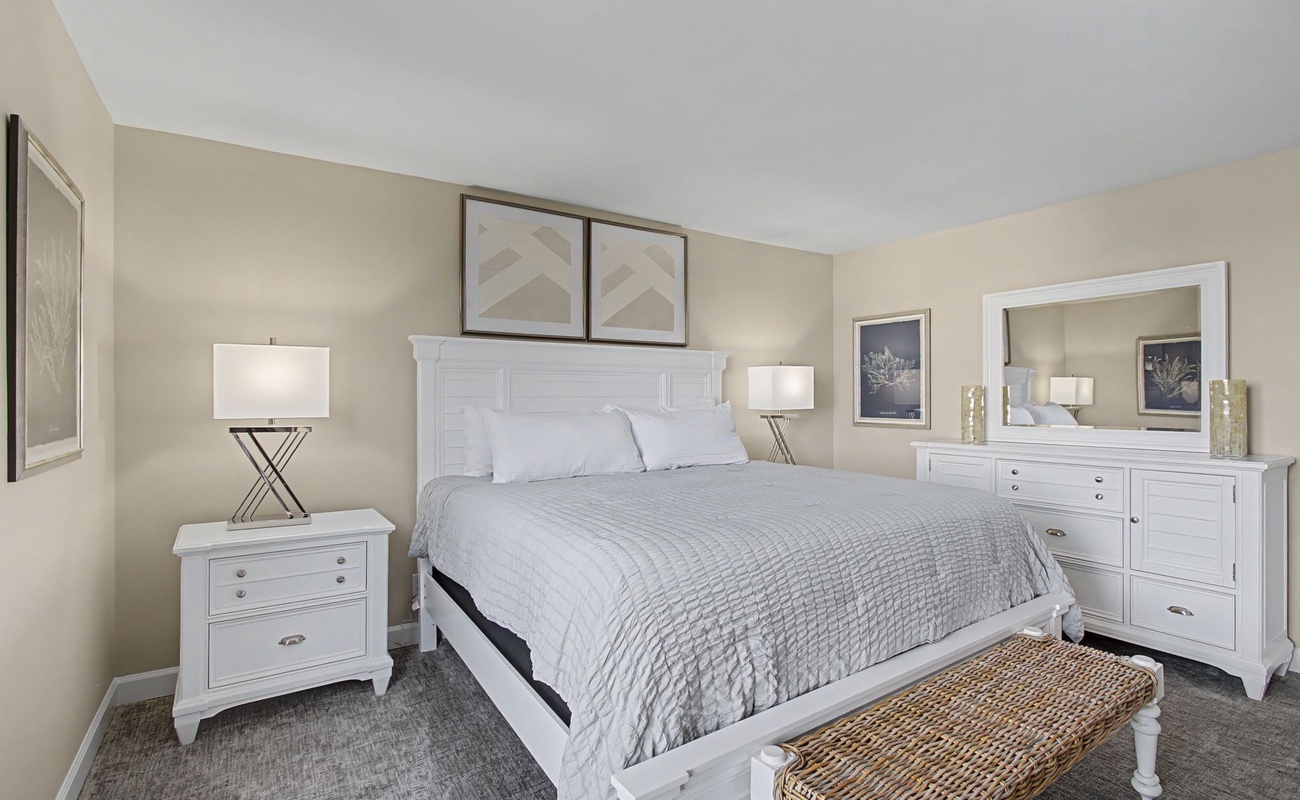 Sink into plush bedding and crisp linens in your serene bedroom retreat, where thoughtful touches create the perfect sanctuary for rest.