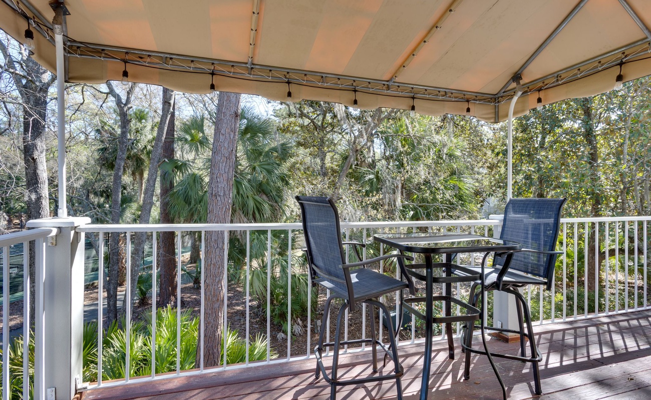 Relax on your private covered balcony surrounded by lush tropical foliage, perfect for morning coffee or evening wind-down.