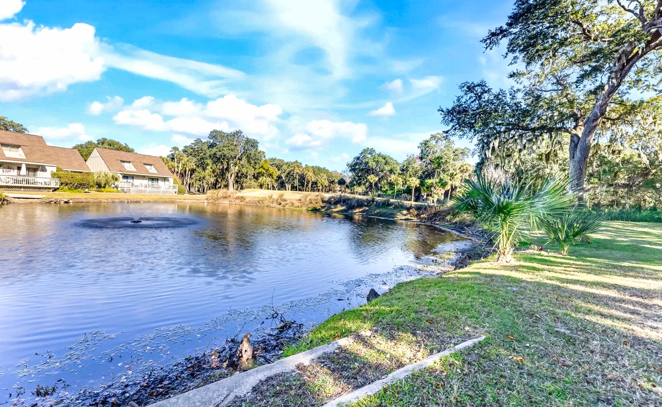Waterfront property with serene lagoon views, lush landscaping, and peaceful natural surroundings for a tranquil getaway.