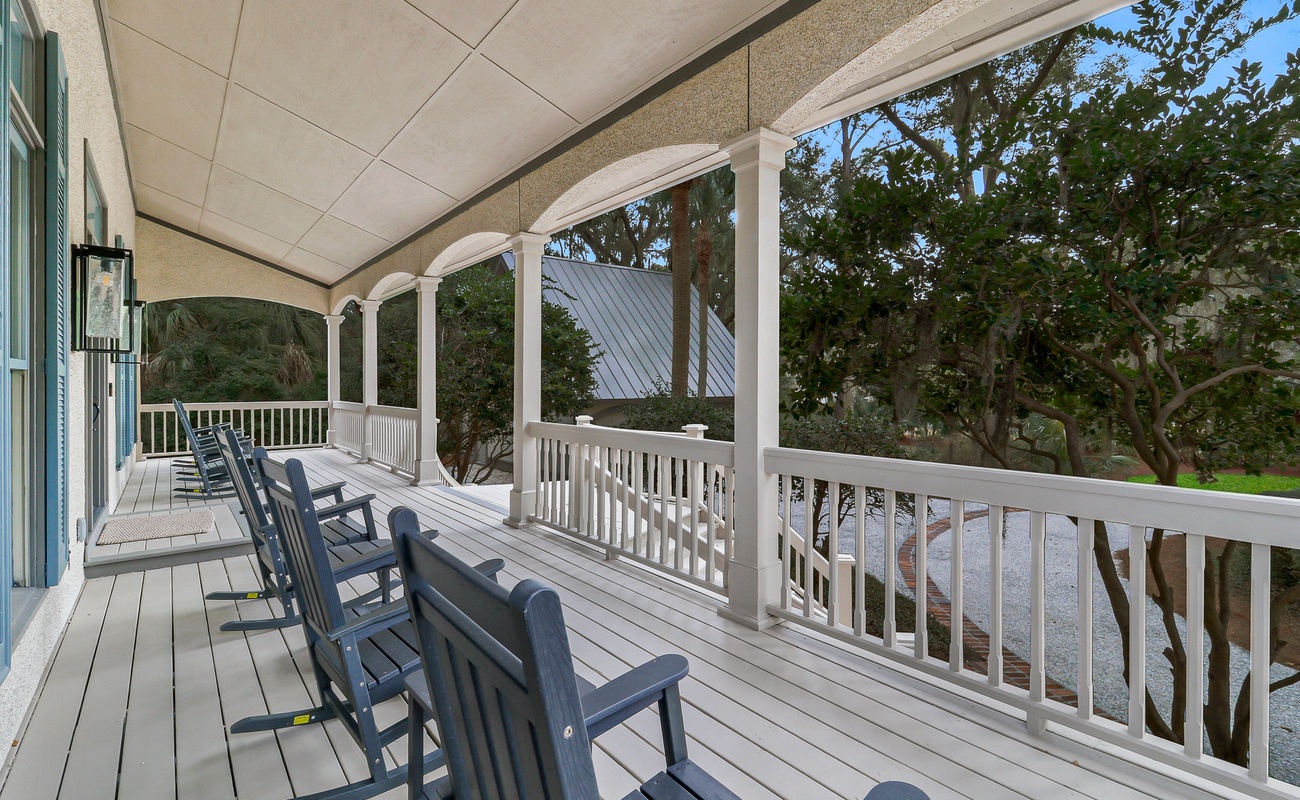 Relax on your spacious wraparound porch with comfortable rocking chairs, perfect for morning coffee and evening conversations.