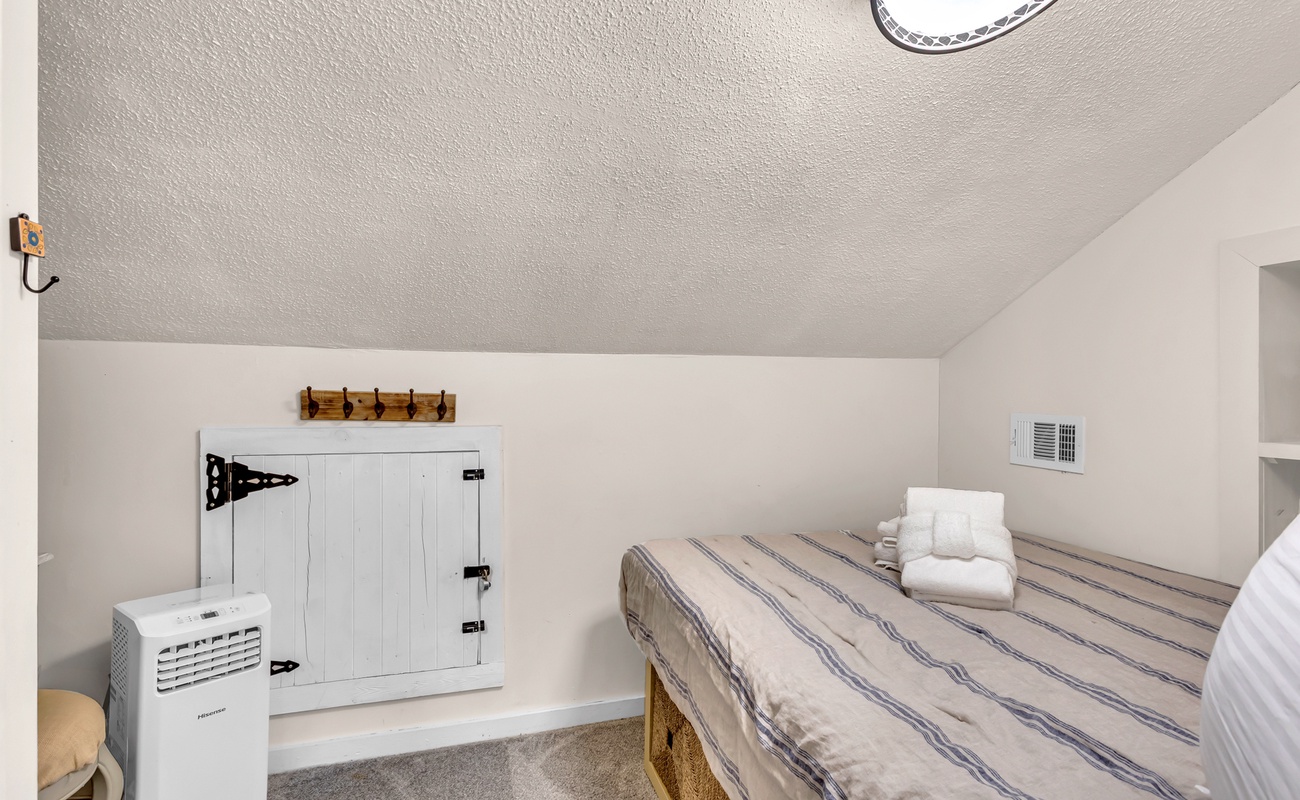 Cozy office space with sleeping area