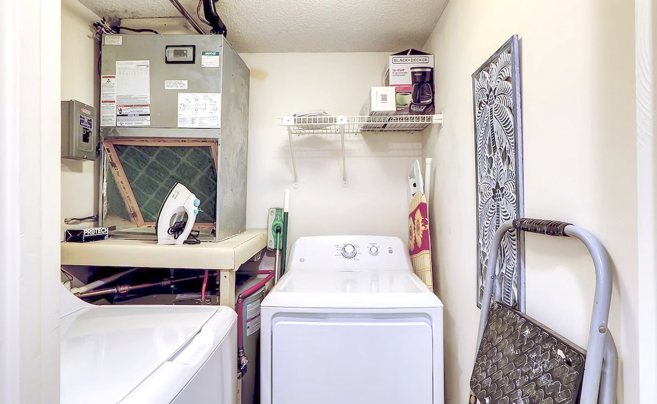 Your dedicated laundry room keeps your vacation wardrobe fresh with a full-size washer, dryer, and iron station ready for your convenience.