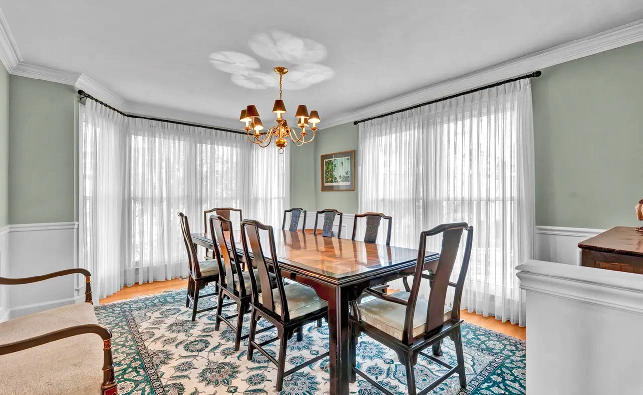 Gather around this elegant dining table where memorable meals and conversations await your group.