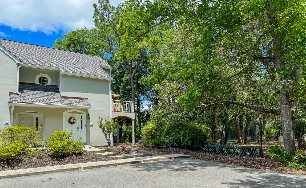 Exterior Entrance with Parking Spaces and Bike Racks