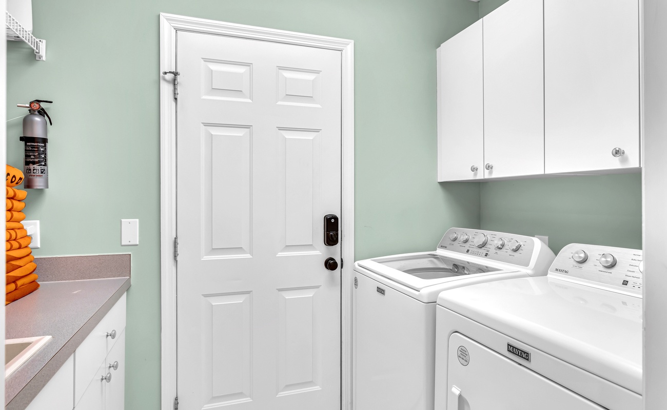 Your dedicated laundry space features full-size washer and dryer with plenty of storage for all your vacation essentials.