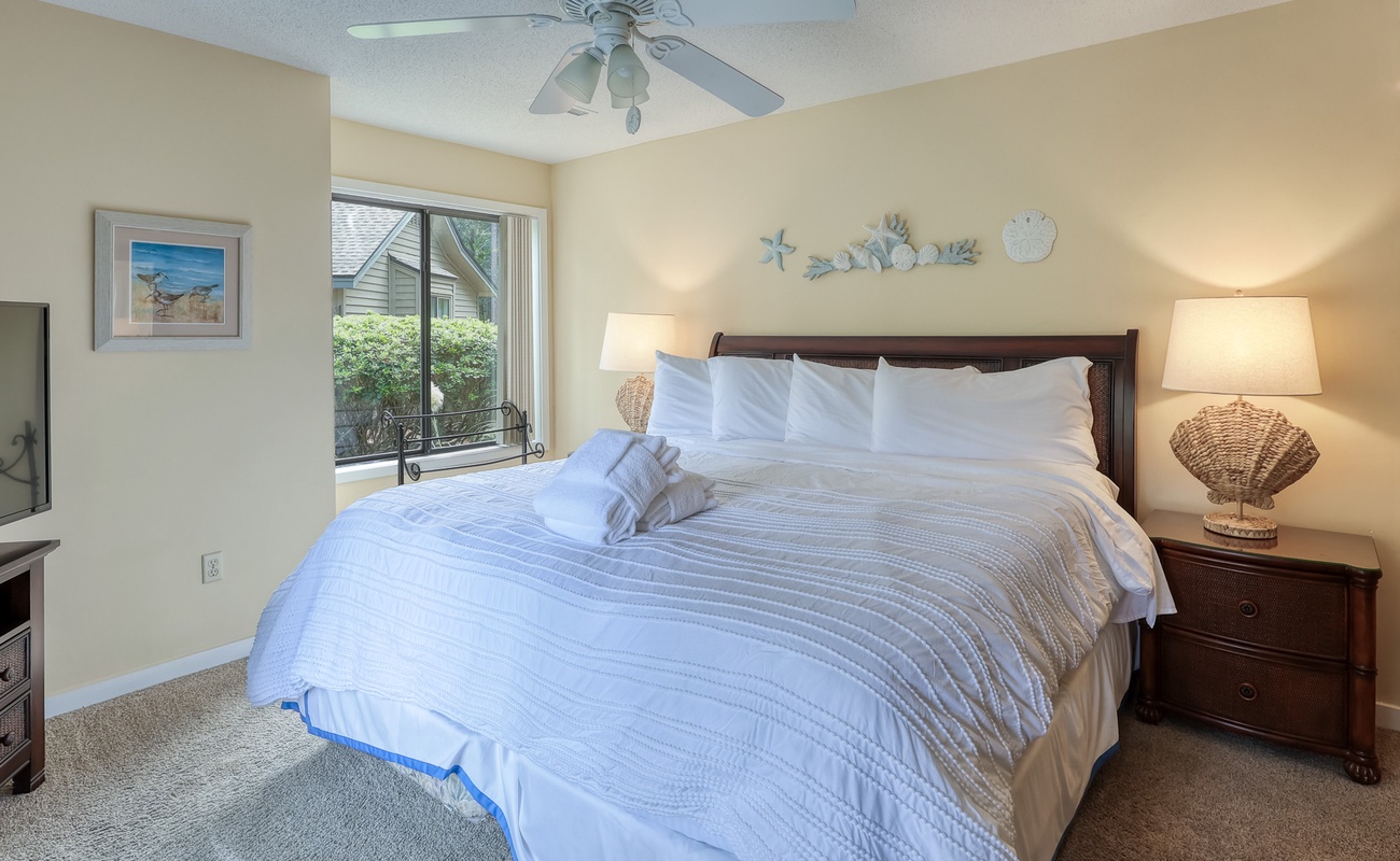 Downstairs Primary Suite with Golf Course Views