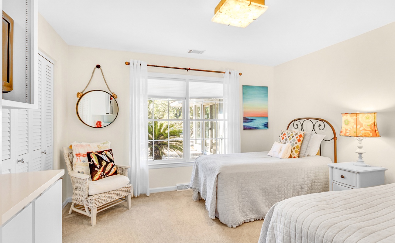 Wake up in your bright, coastal-inspired bedroom with twin beds and charming seaside décor that makes you feel instantly at home.