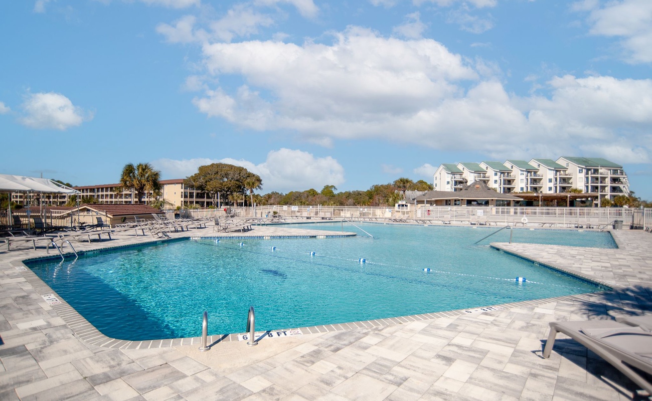 Spacious resort-style pool with crystal-clear waters and ample deck space for lounging under Florida's beautiful skies.