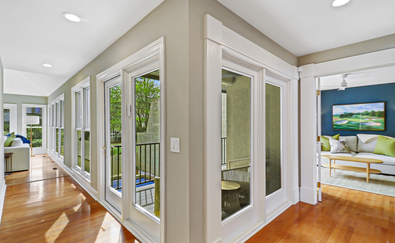 Enjoy your morning coffee in this bright corner space with beautiful hardwood floors and French doors opening to the balcony.
