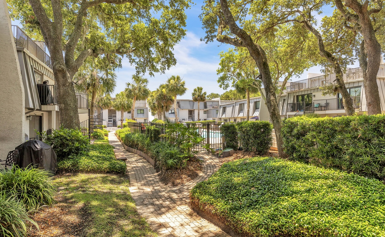 Private Patio Next to Community Pool and Walk to Beach