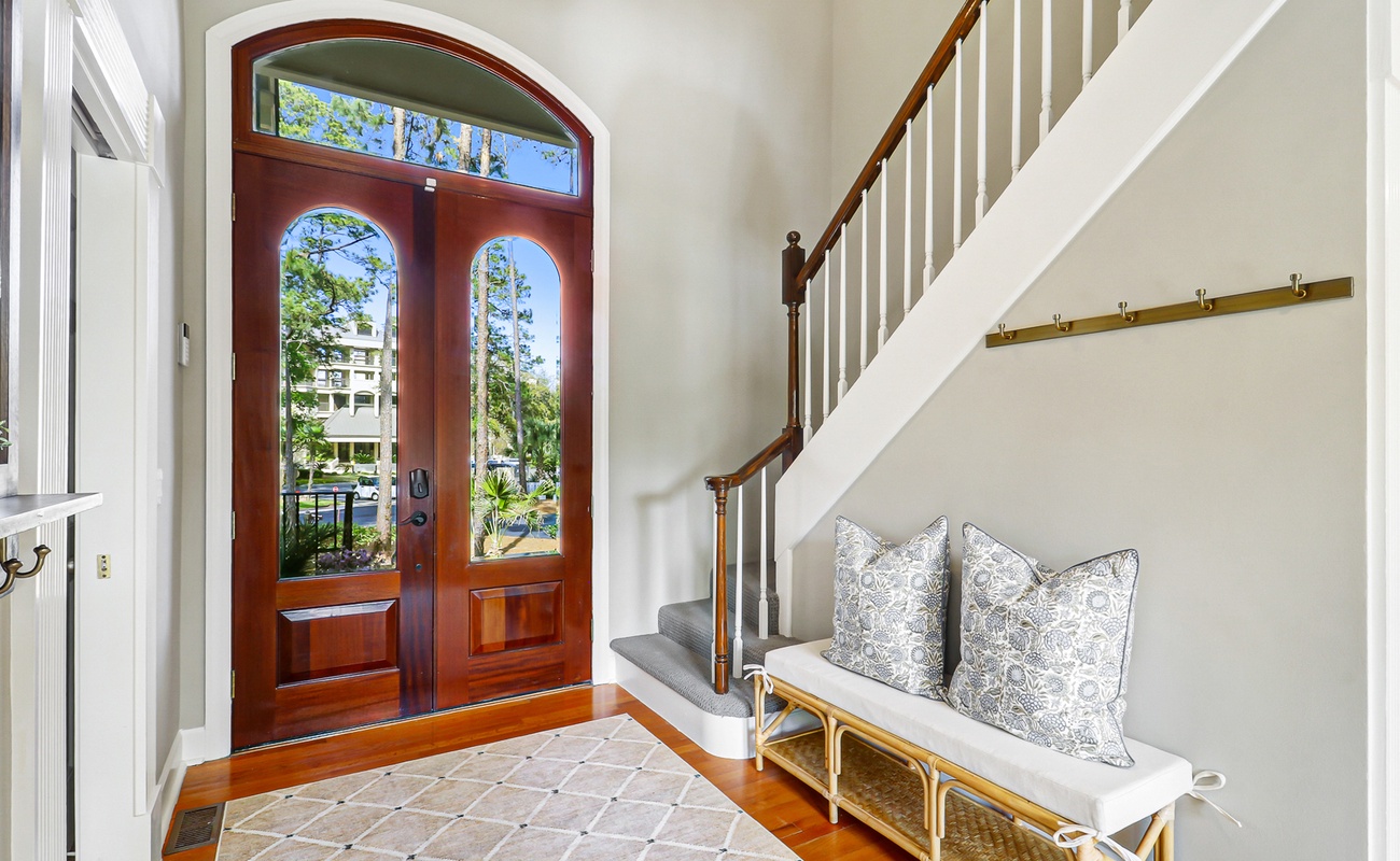 Welcoming entryway with charming coastal touches, setting the tone for a warm and inviting stay from the moment you arrive.
