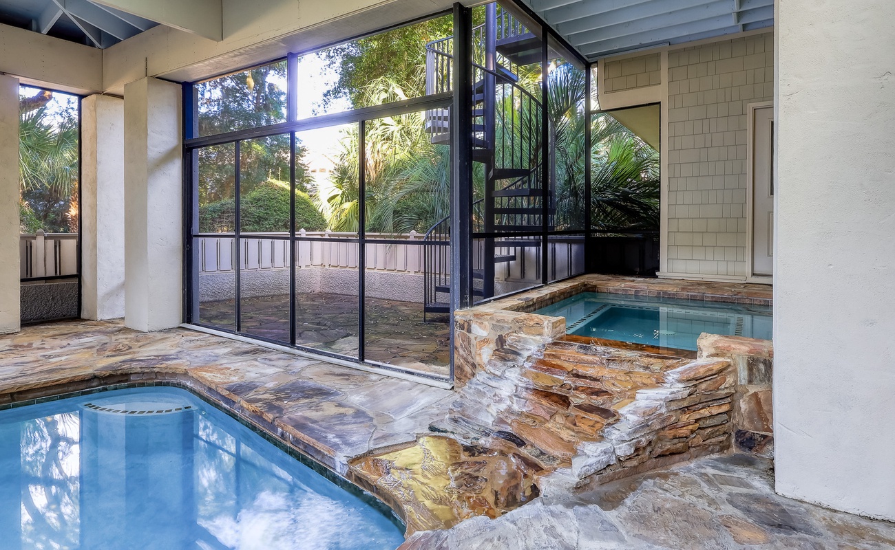 Screened in Pool and Spa Area with Grill Area (Pool and spa heat can be added for an additional cost)