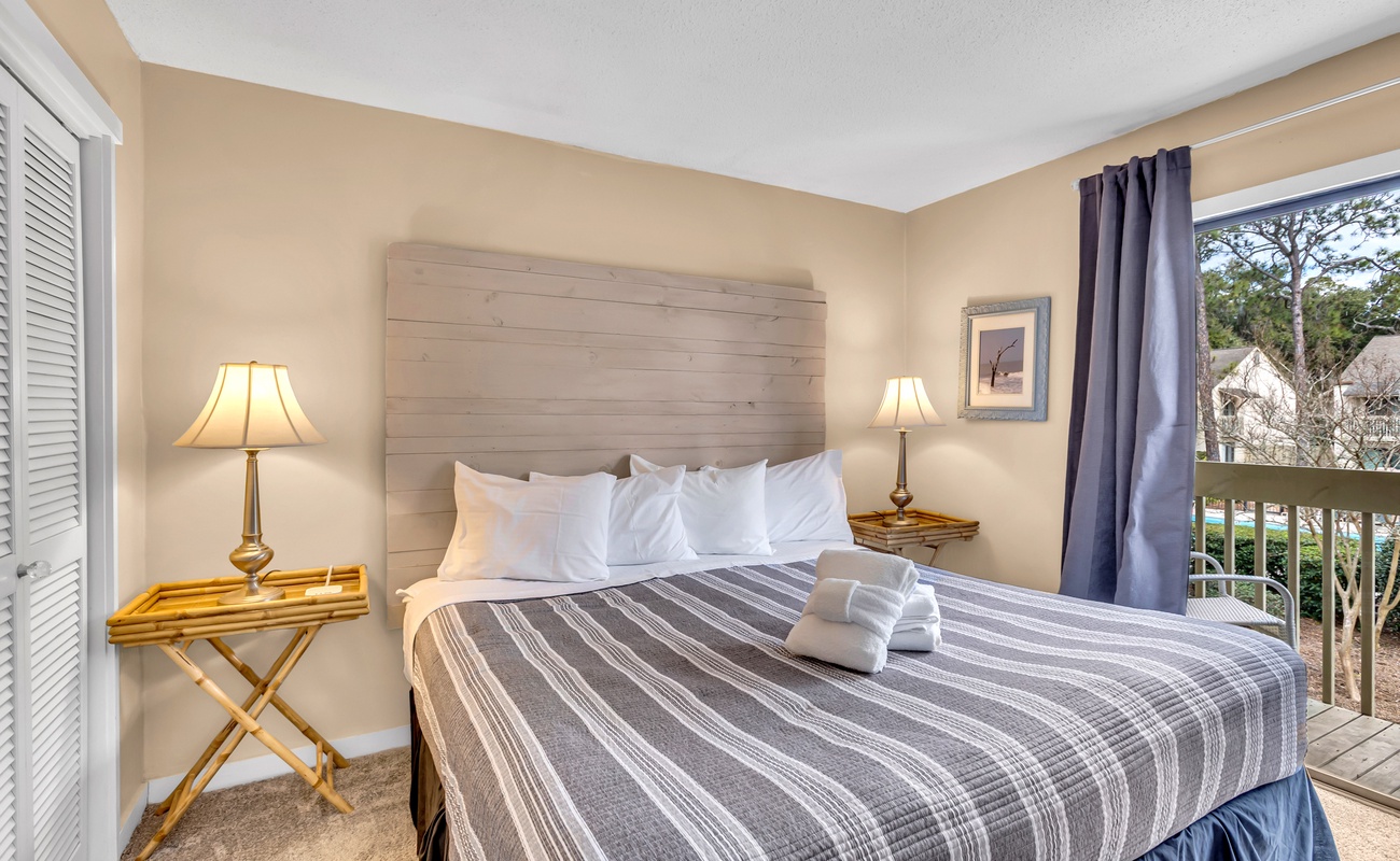 Sink into plush bedding while gentle morning light filters through windows, creating the perfect sanctuary for rest.