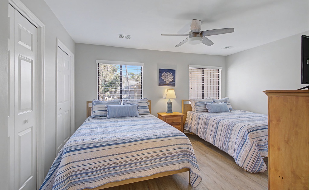 Drift off peacefully in your bright, comfortable twin bedroom with coastal-inspired decor and soothing ocean views.