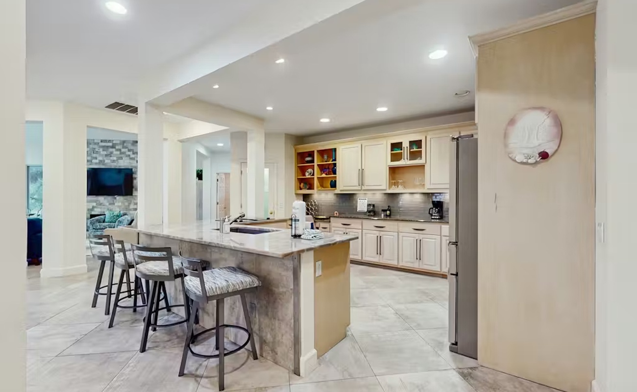 Gather around this spacious kitchen island where you'll love preparing meals and sharing stories over morning coffee.