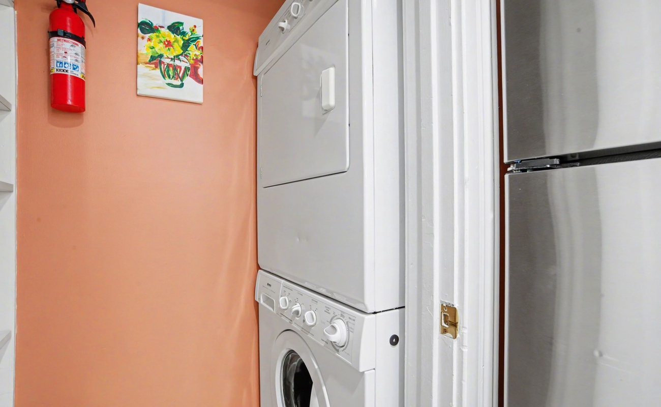 Your laundry needs are covered with this convenient in-unit washer and dryer stack, making longer stays comfortable and hassle-free.