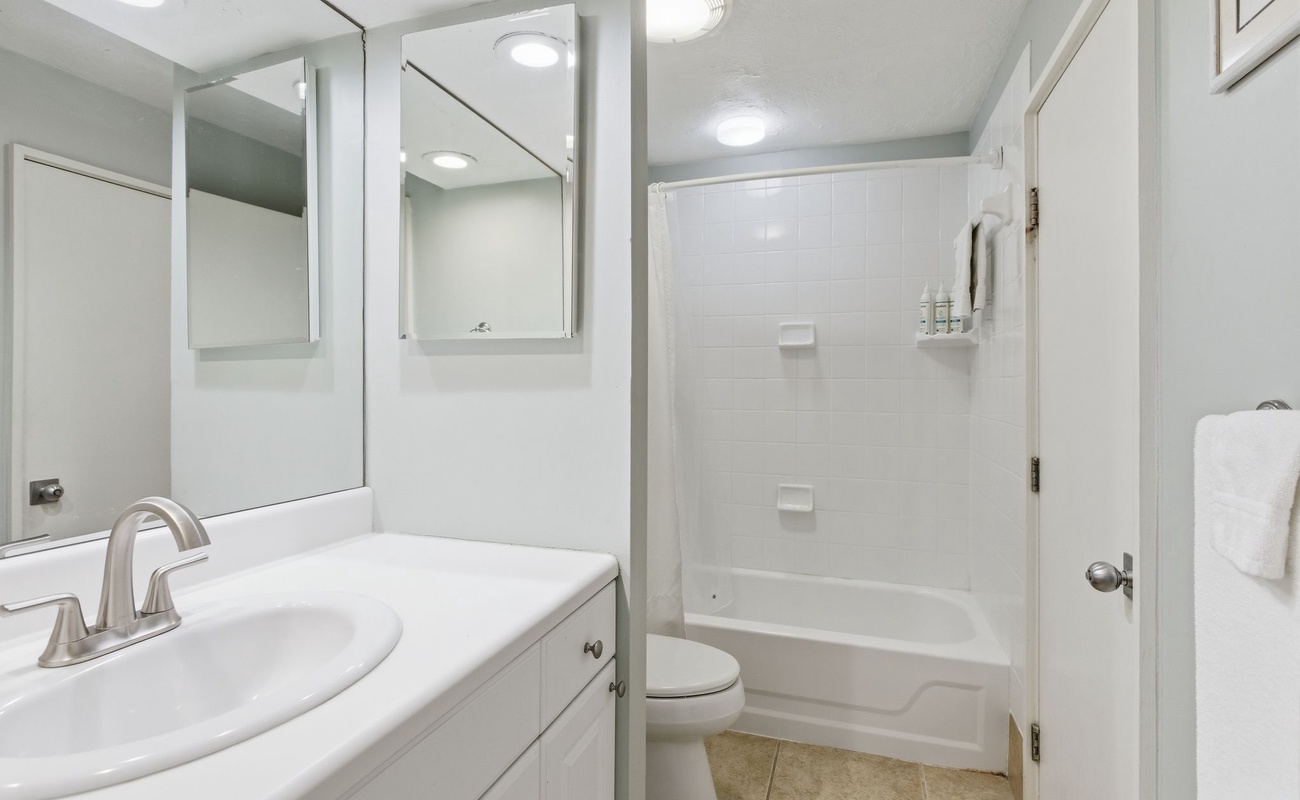 Your private bathroom features a spacious tub-shower combo and vanity with plenty of counter space for your toiletries.