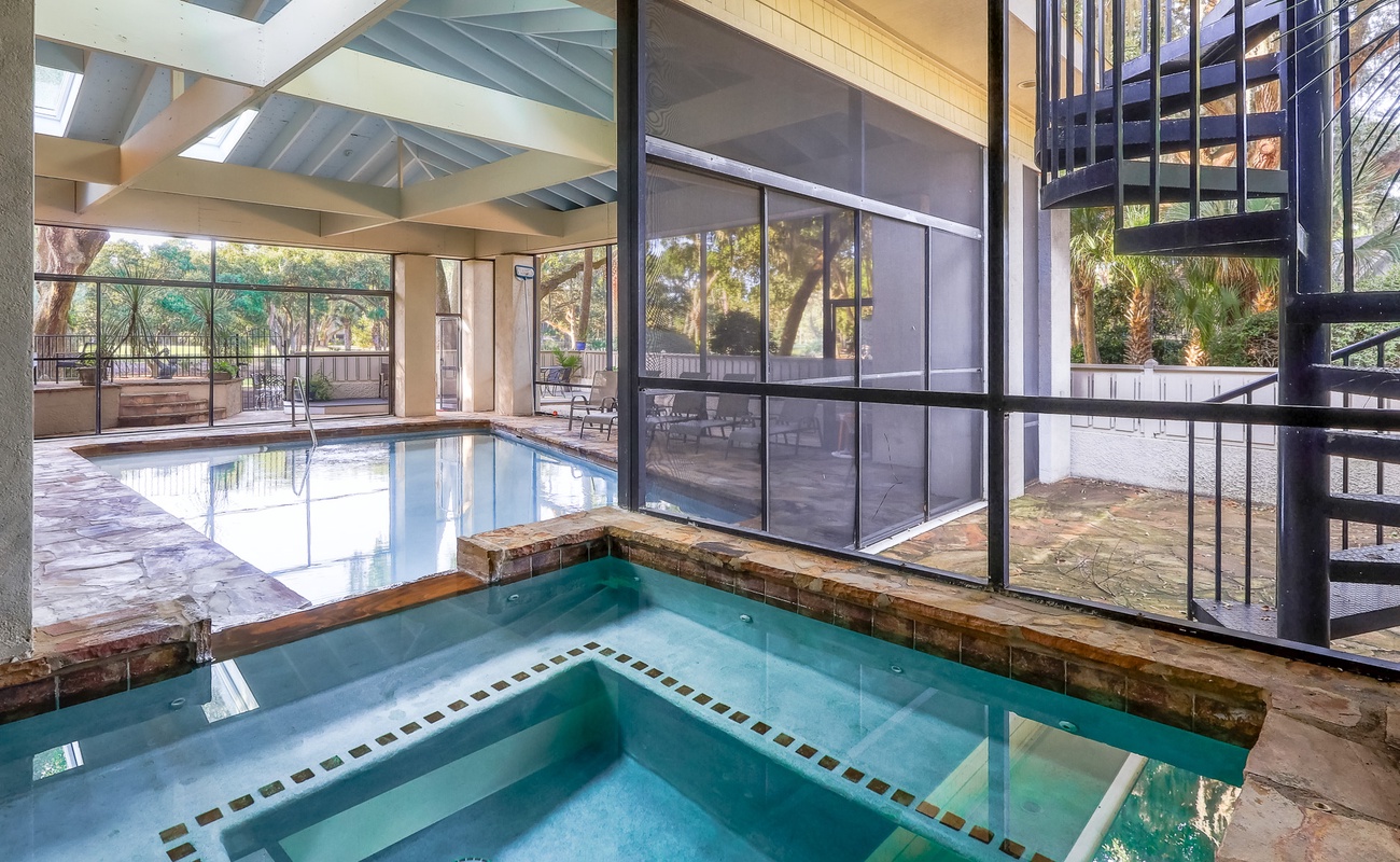 Screened in Pool and Spa Area with Grill Area (Pool and spa heat can be added for an additional cost)