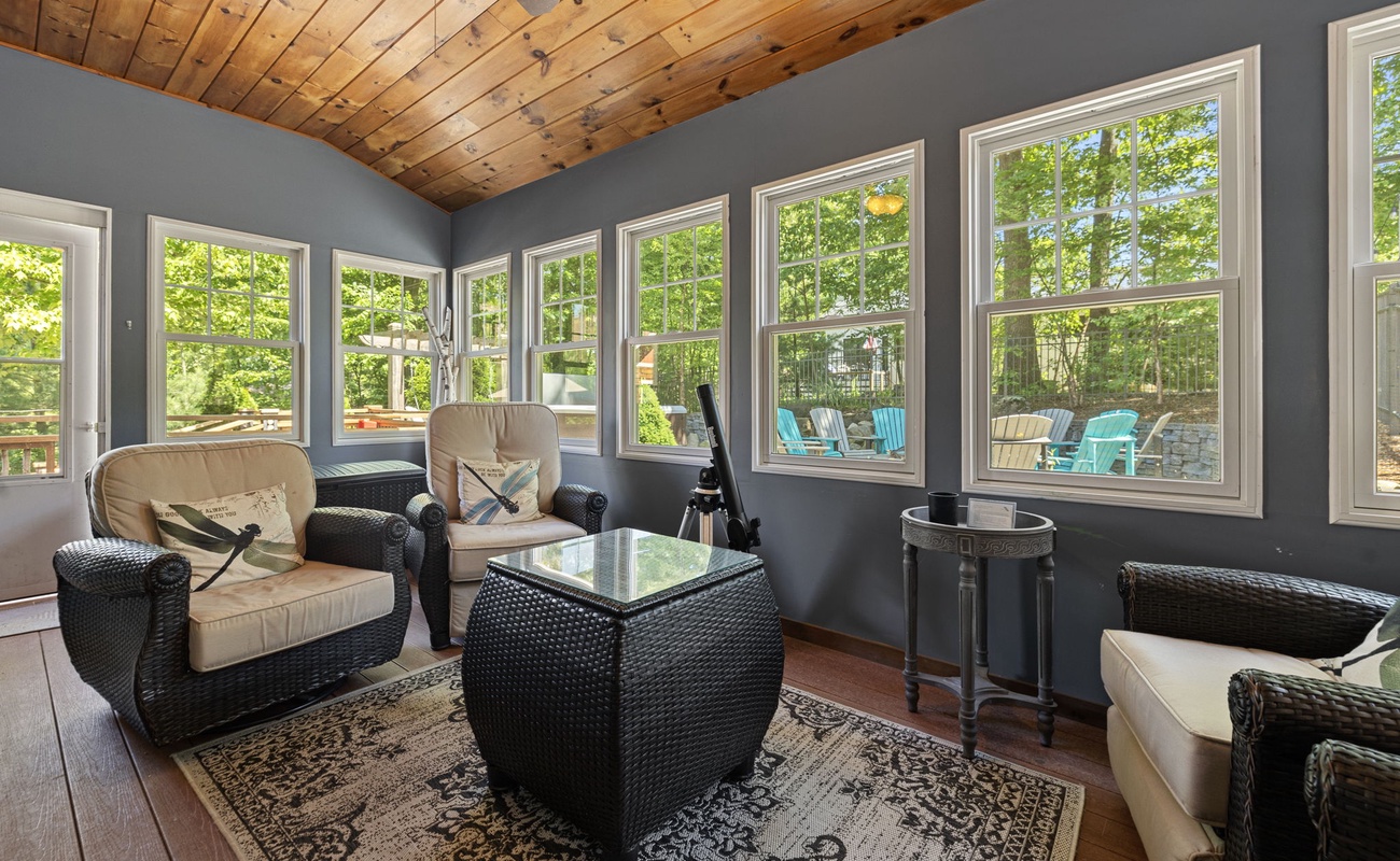 The three-season room is a wonderful spot to take morning coffee.