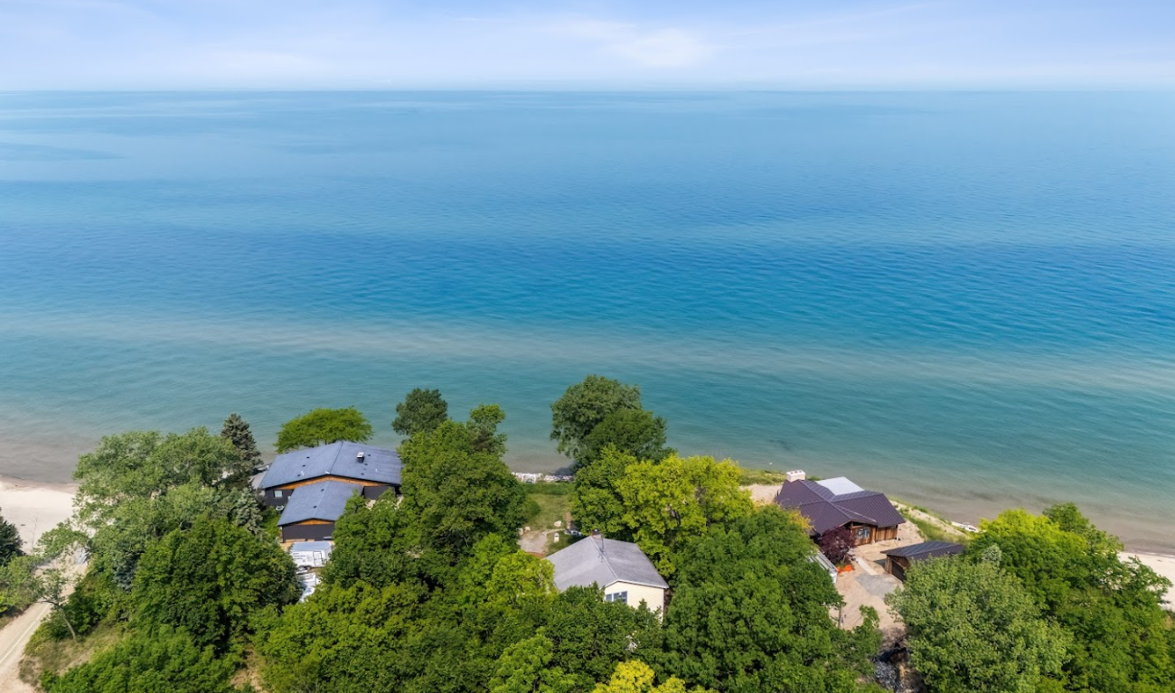 Endless blue, private shoreline—pure lakefront bliss.