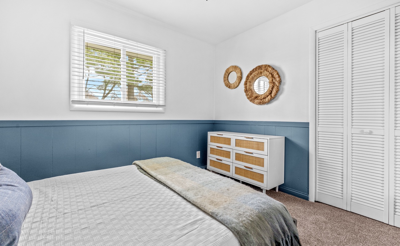 Bright, breezy, and beautifully simple. Wake up refreshed in this peaceful bedroom.