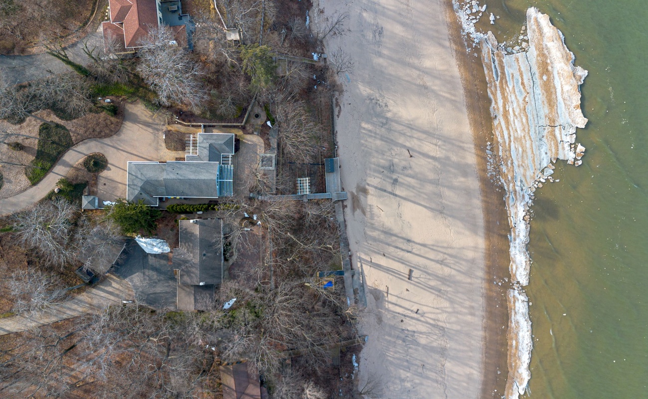 Aerial photo in winter of Sunset Shores Sanctuary and the Lake Michigan beach.