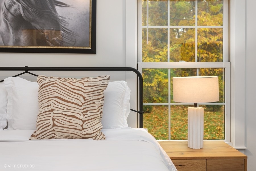 Bedside lamps are thoughtfully included in each bedroom for late night readers.