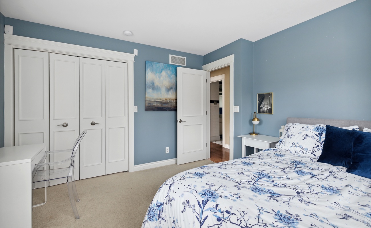 Bedroom 2 is on the main level & has a queen-size bed.