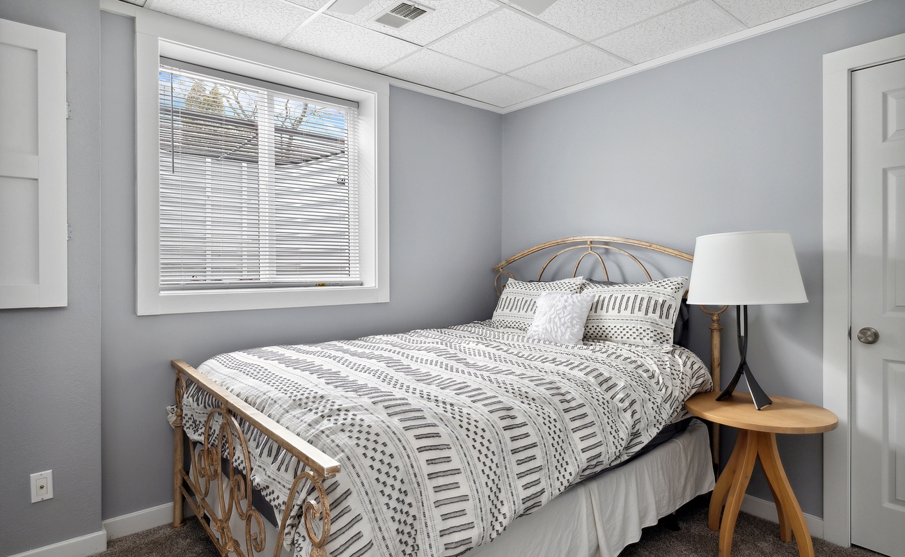 Bedroom 6 is on the lower level & has a queen-size bed.