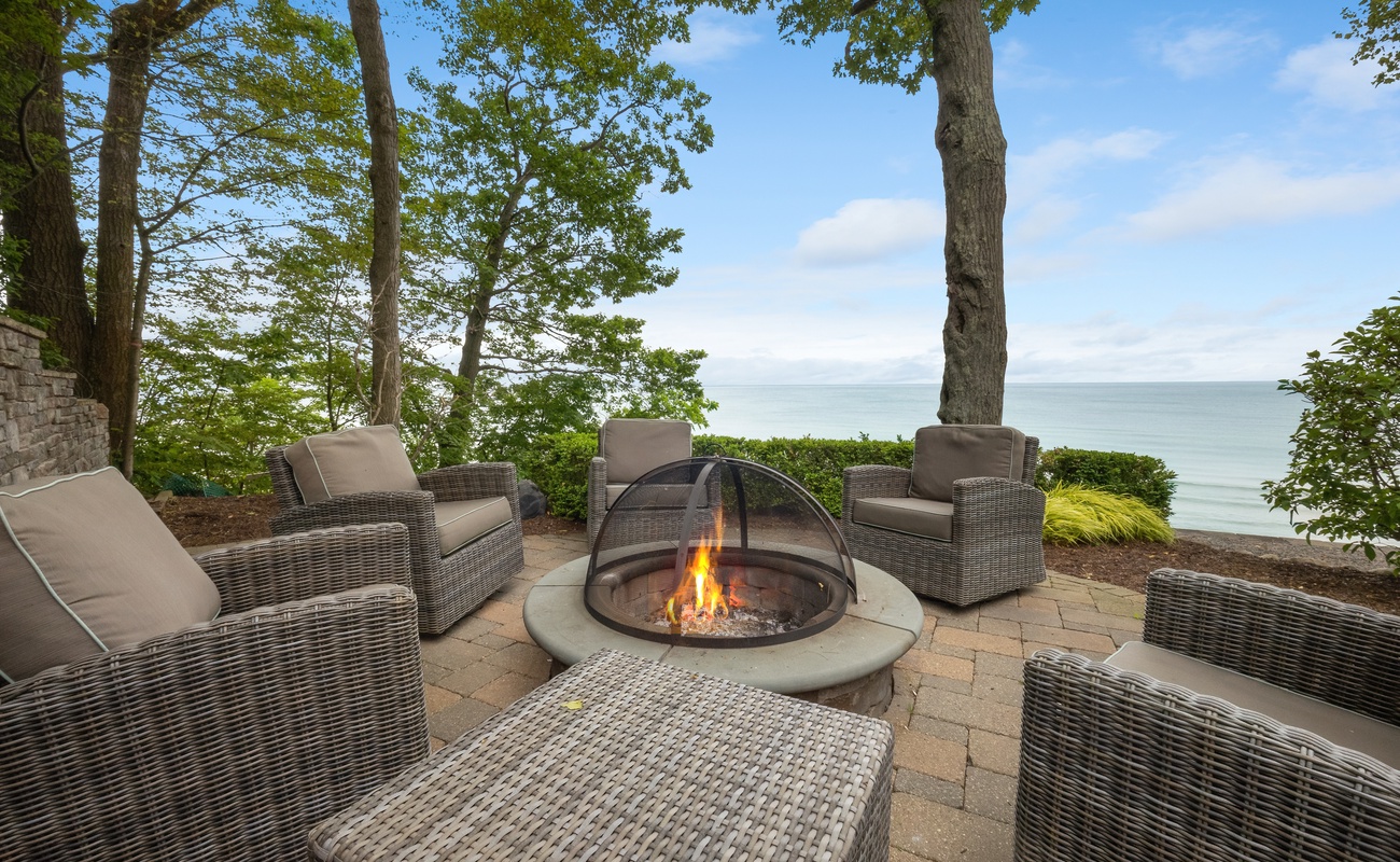 Cozy up by the fire, steps from the shore.