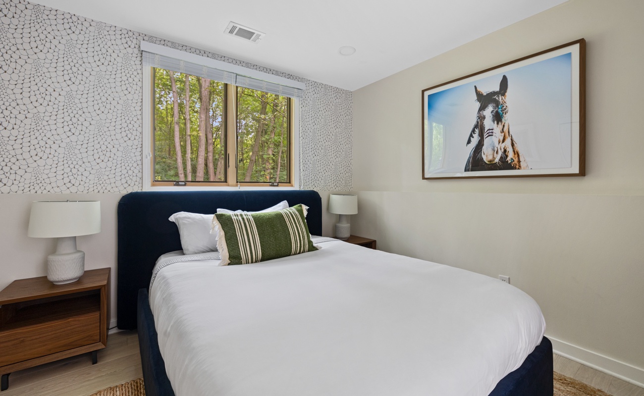 Bedroom 2 is on the lower level & has a queen-size bed.