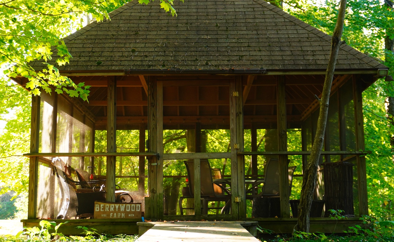 A quiet forest hideaway awaits in the Berrywood Farm gazebo.