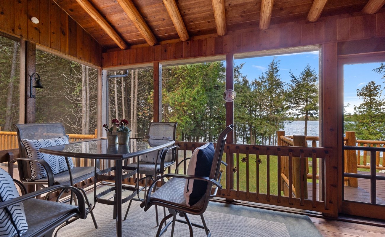 Dine outdoors on the screened porch - no bugs allowed!