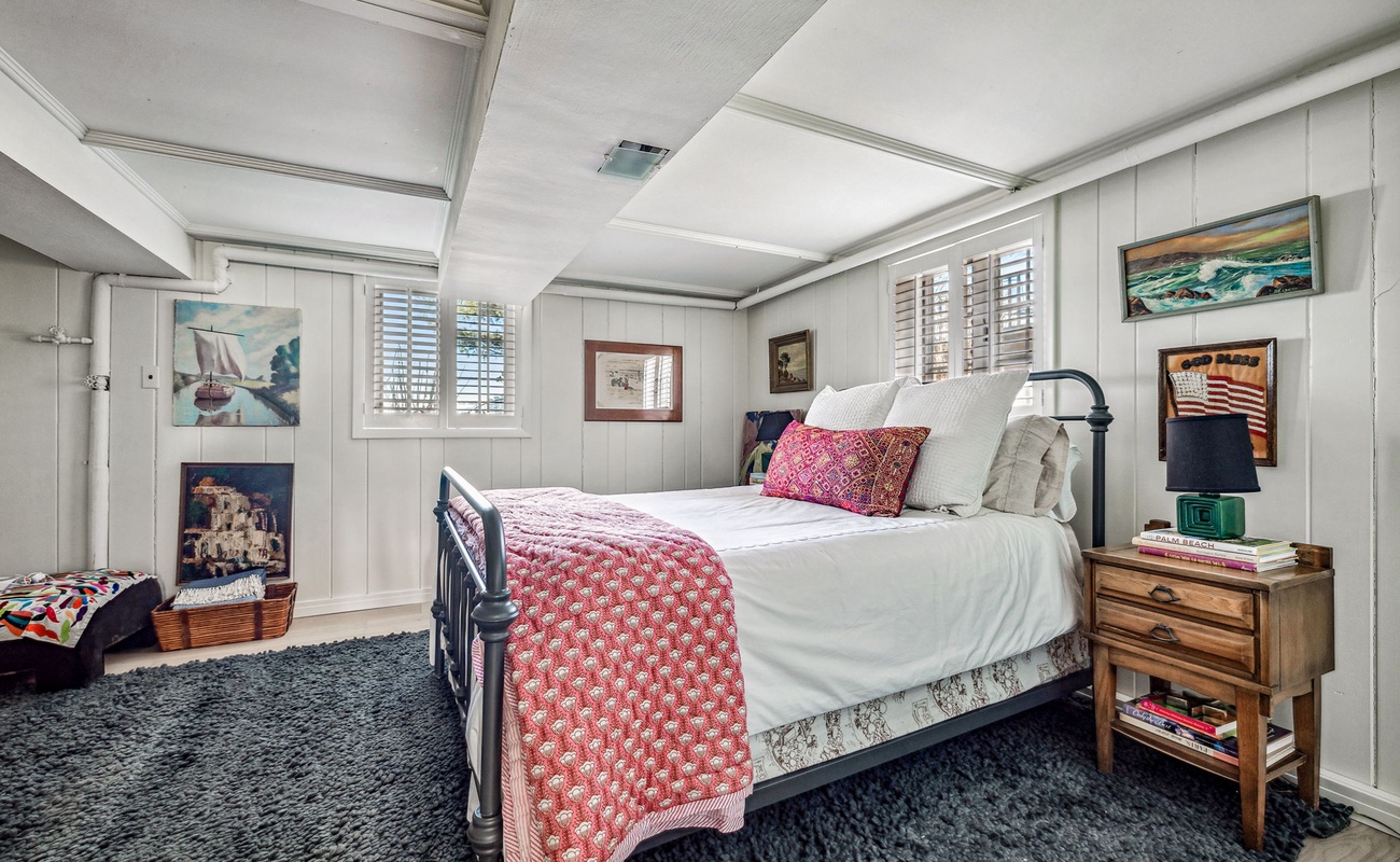 Bedroom 4 is on the lower level & has a queen-size beds.