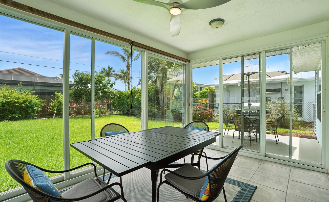 Dine in the shade with sunny garden views all around.