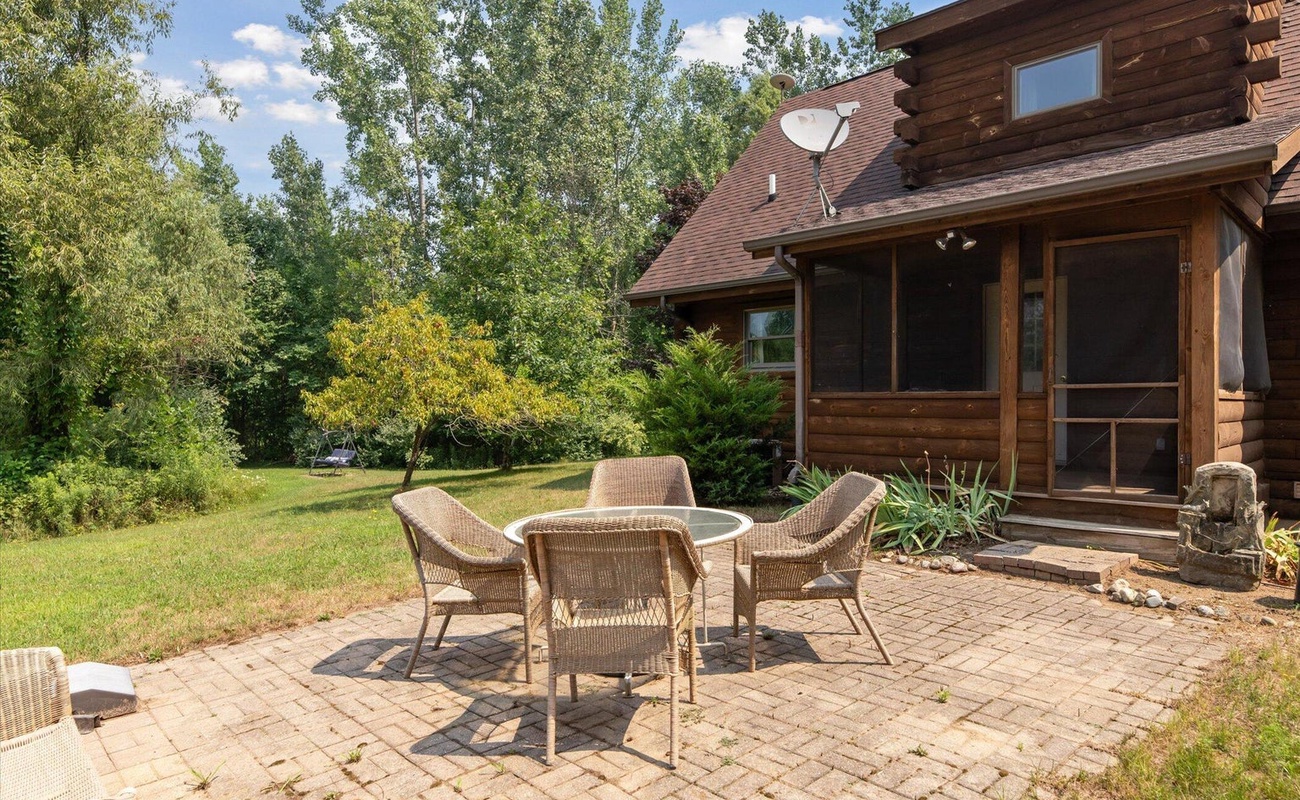 Open-air dining in your private backyard retreat.