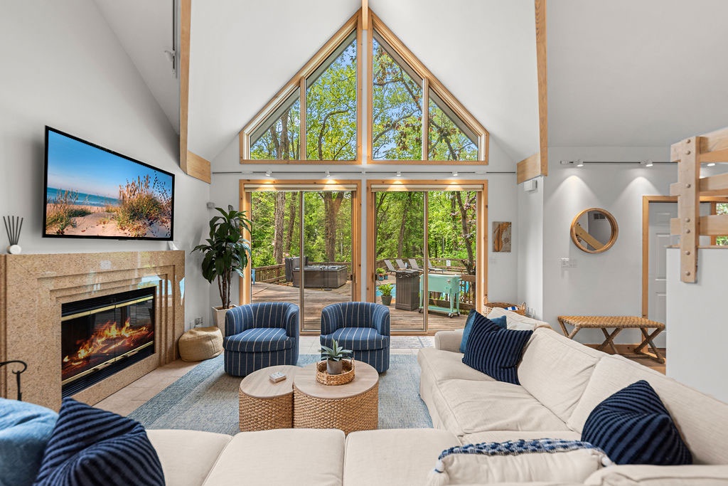 Cozy up fireside with forest views and five-star vibes.