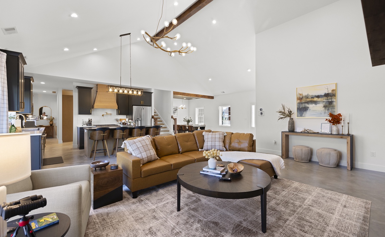 A bright open living area made for gathering relaxing and enjoying time together.