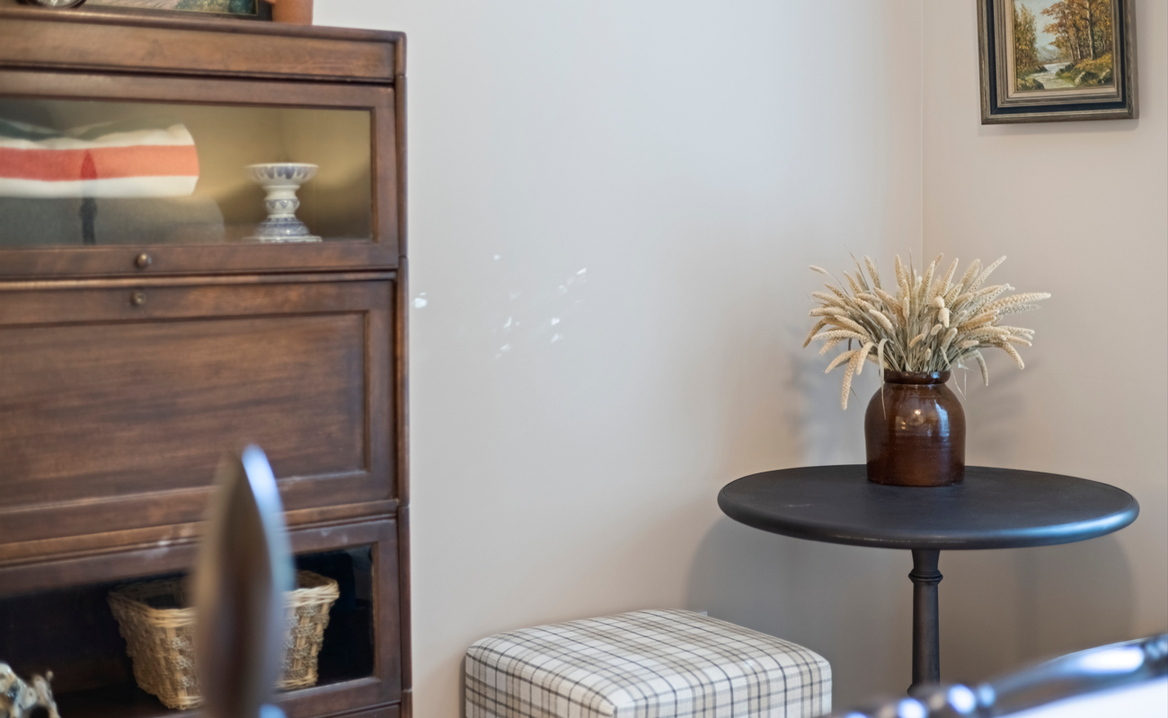 A collected corner filled with natural light and quiet beauty.