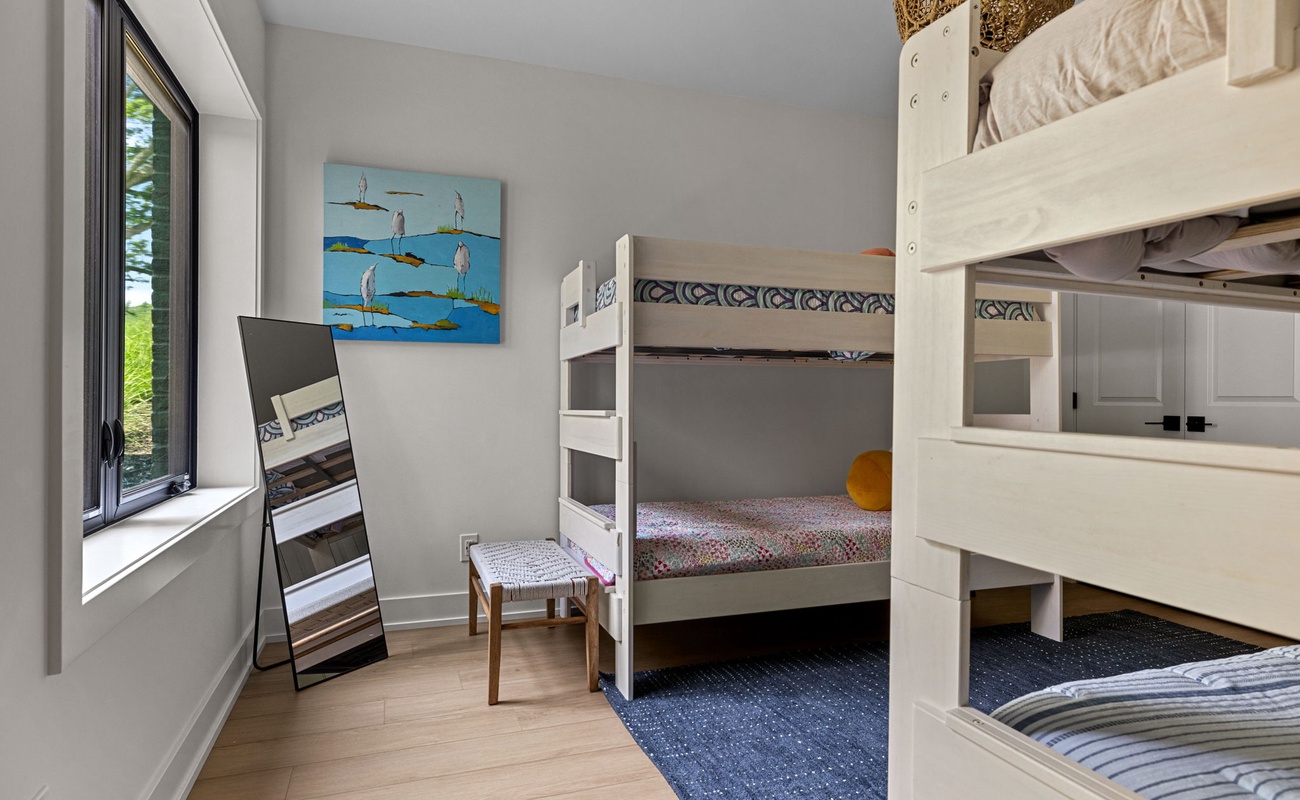 Bedroom 7 is on the lower level & has a 2 twin-size bunkbeds.