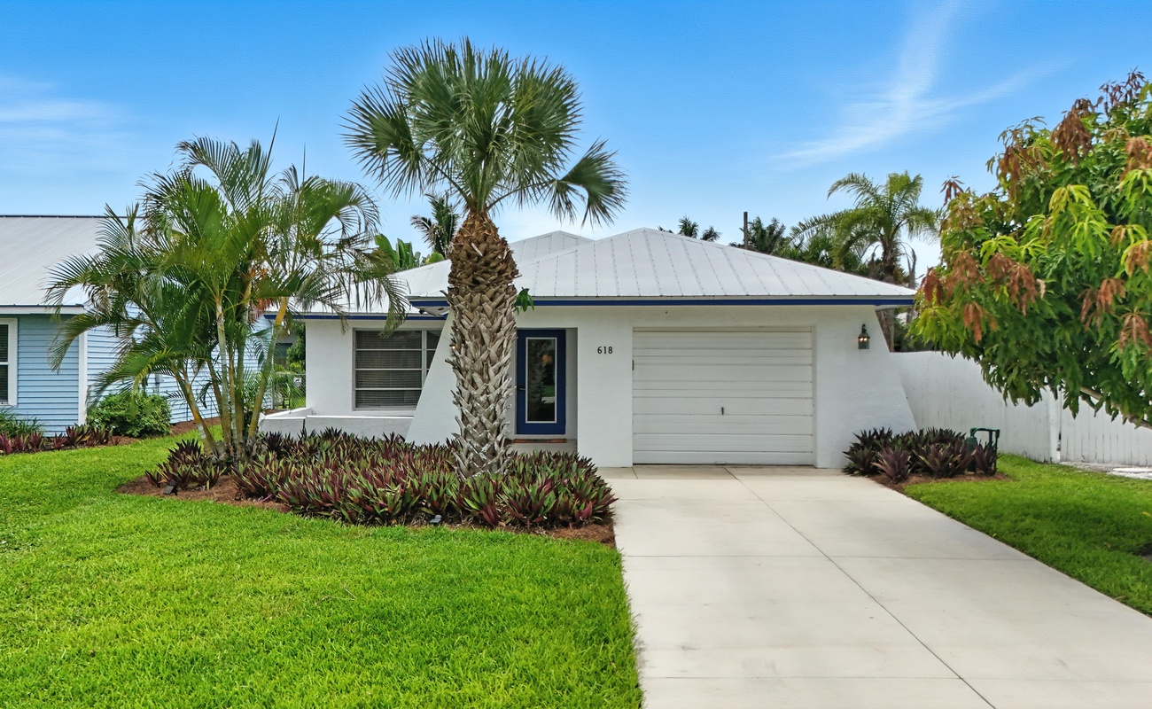 Welcome to your stylish Naples escape under the palms.