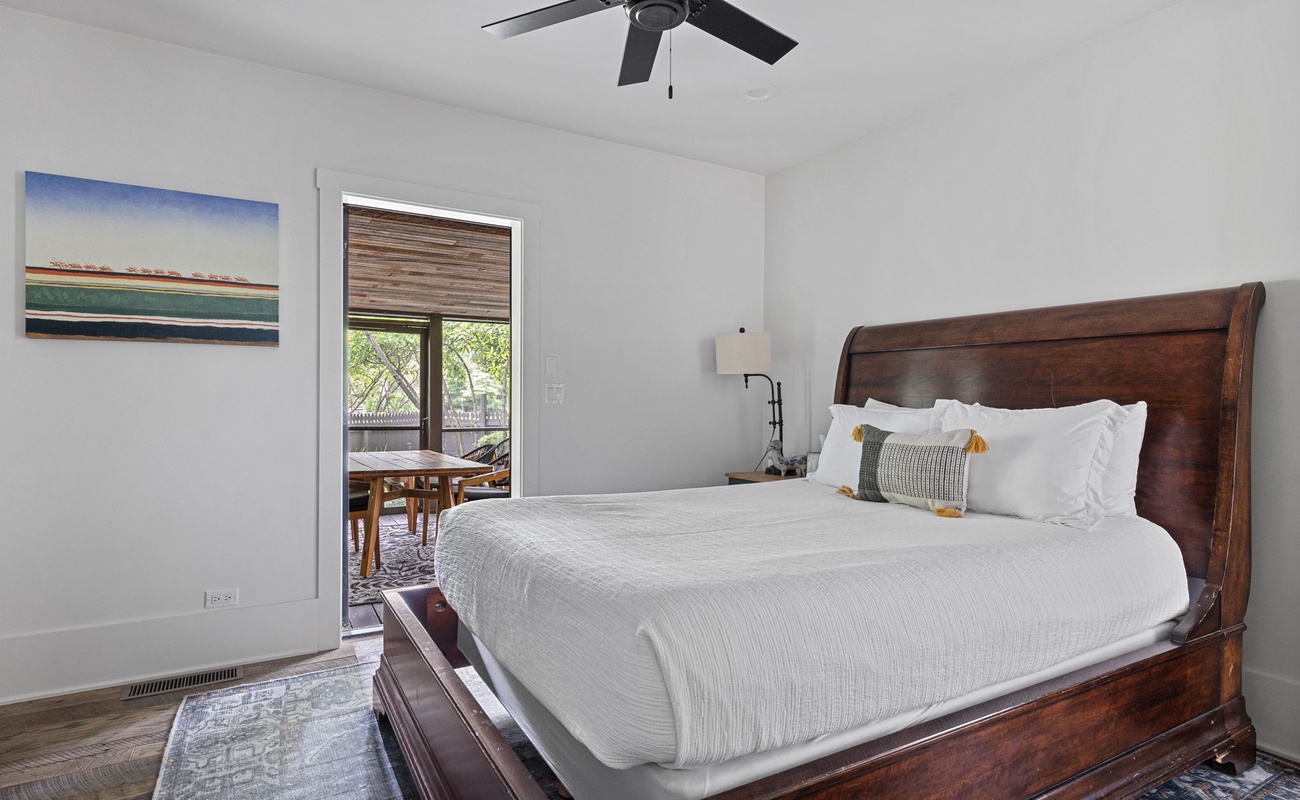 Bedroom 2 is in the main level & has a queen-size bed.