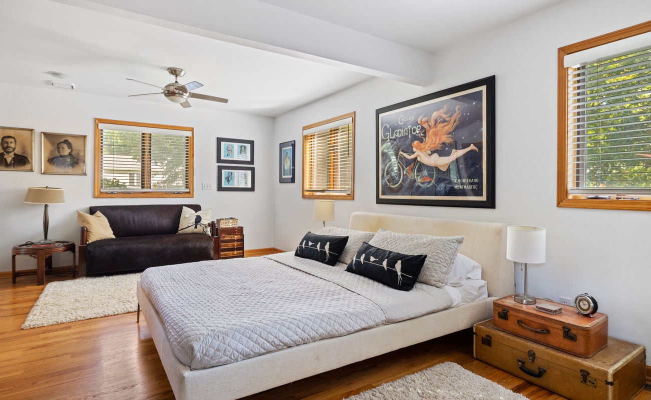 Primary bedroom is on the main level & has a king-size bed.