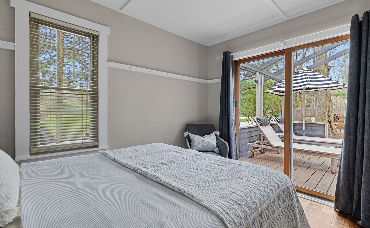 This bedroom has easy-peasy access to the fire-side ready deck. Ooh-la-la!