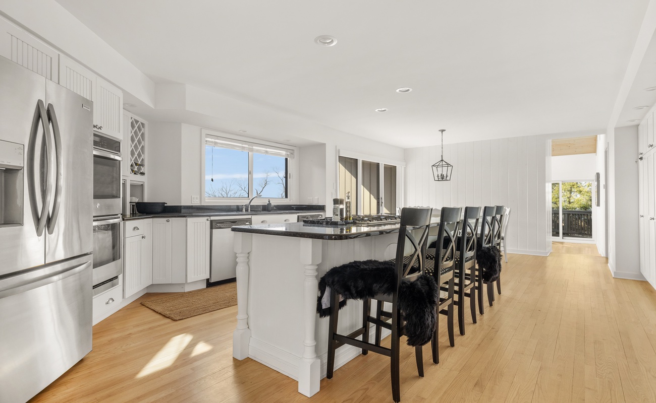 The open design kitchen is inviting. Anyone up for some tasty morning coffee?