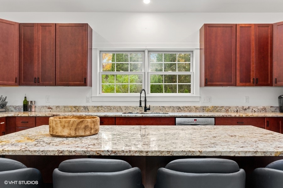 The kitchen’s island workstation is great for serving quick snacks or prepping for large, multi-course meals.