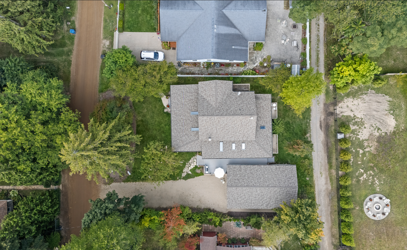 Peaceful coastal living surrounded by natural beauty and blooming trees.